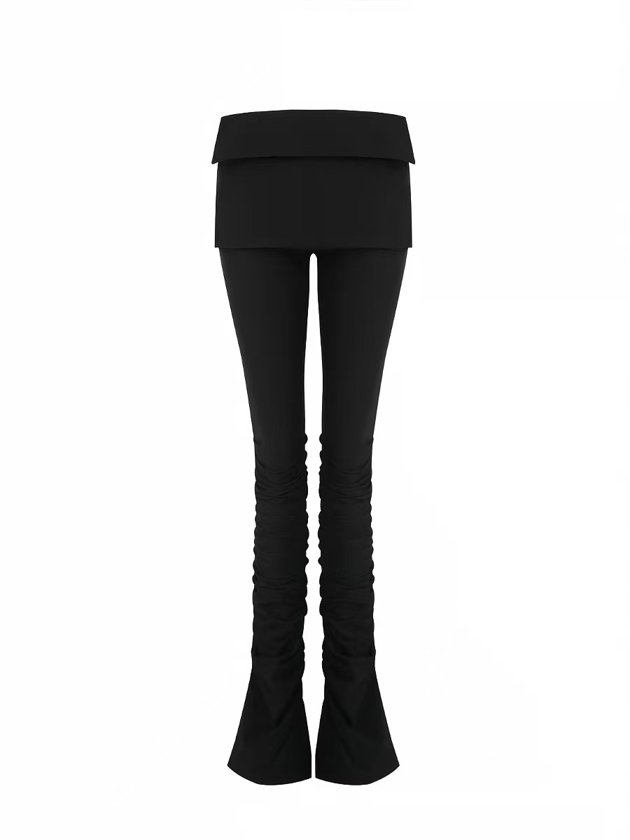 Isolated black ruched trousers on white