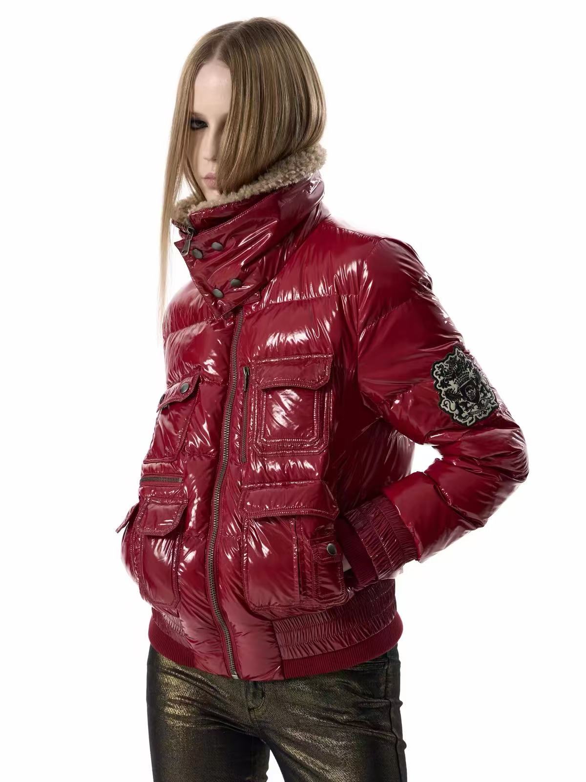 Close-up of glossy red jacket with raised collar
