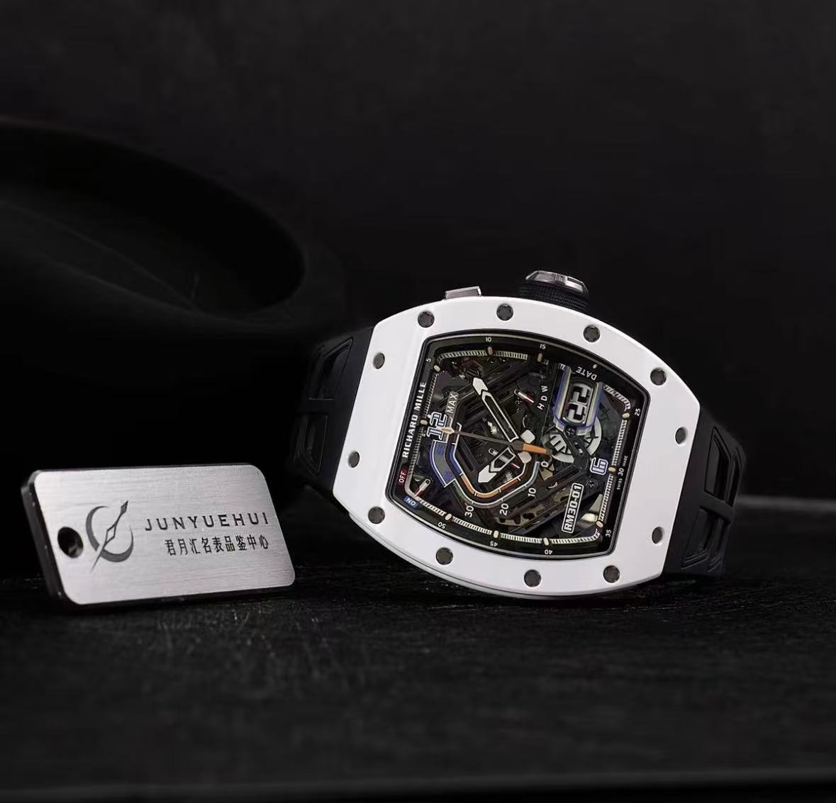 White-cased watch photographed from a low angle