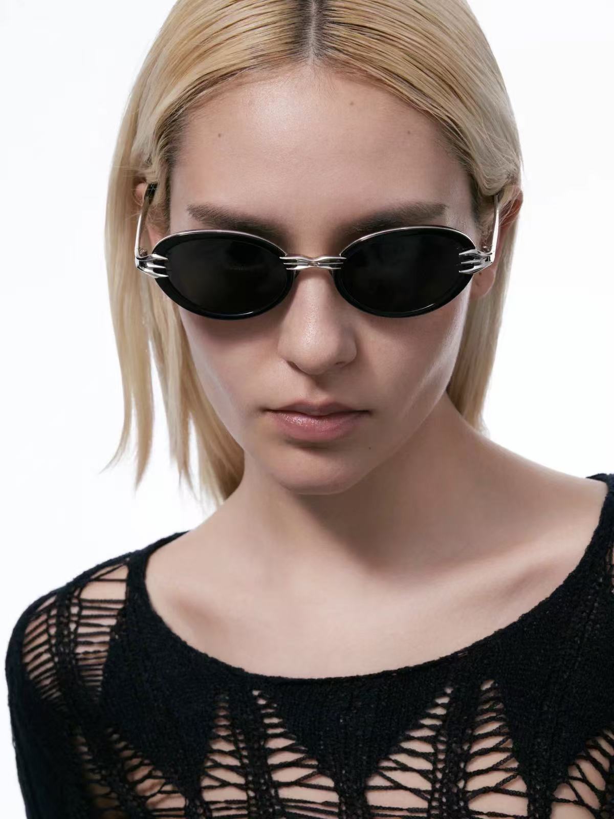 Front portrait showing oval sunglasses